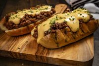 Sloppy Joe Hot Dogs with Creamy Cheese Sauce