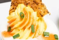 Deviled Eggs Topped with Crispy Fried Chicken Skin