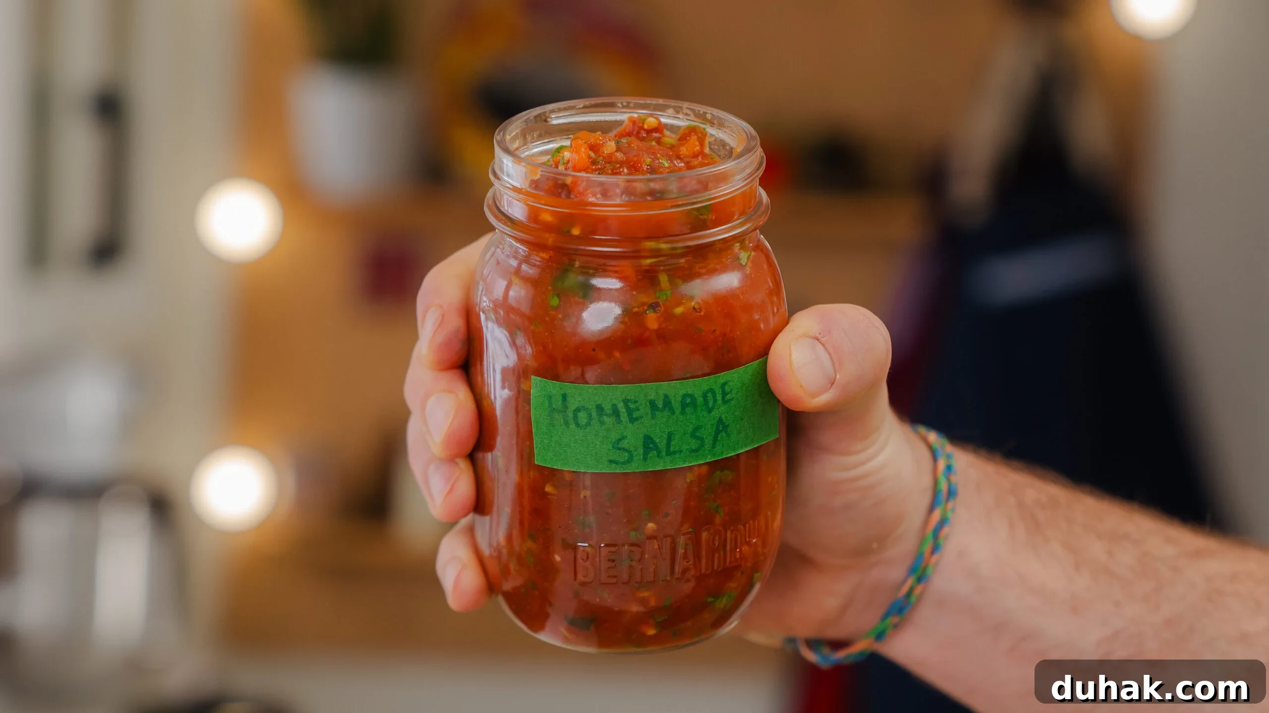 Homemade salsa in a mason jar.