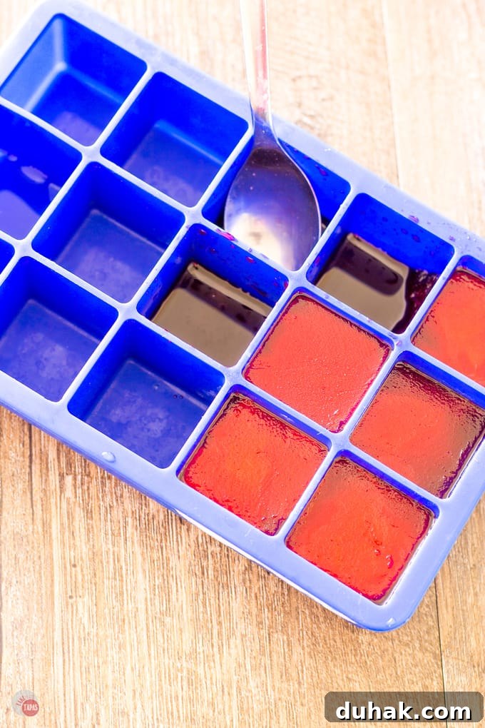 Red Cherry Ice Cubes in an ice tray
