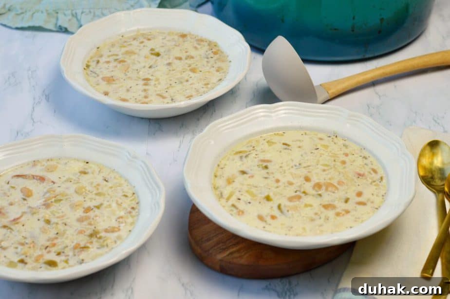 Creamy White Chicken Chili Recipe — Hearty Crockpot & Stovetop Options 4 3 white bowls filled with white chicken chili