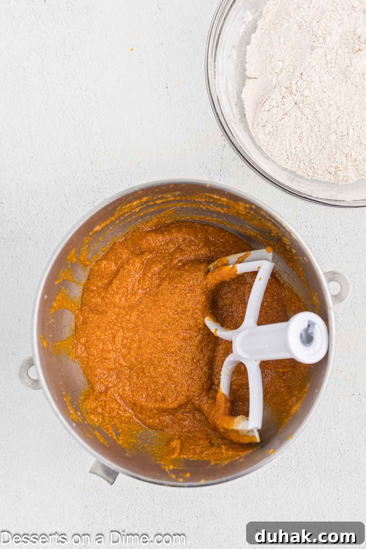 Mix in the canned pumpkin to the mixture. 