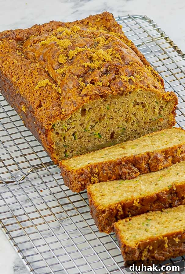 slices of Cinnamon Crumble Zucchini Bread Recipe on wire cooking rack