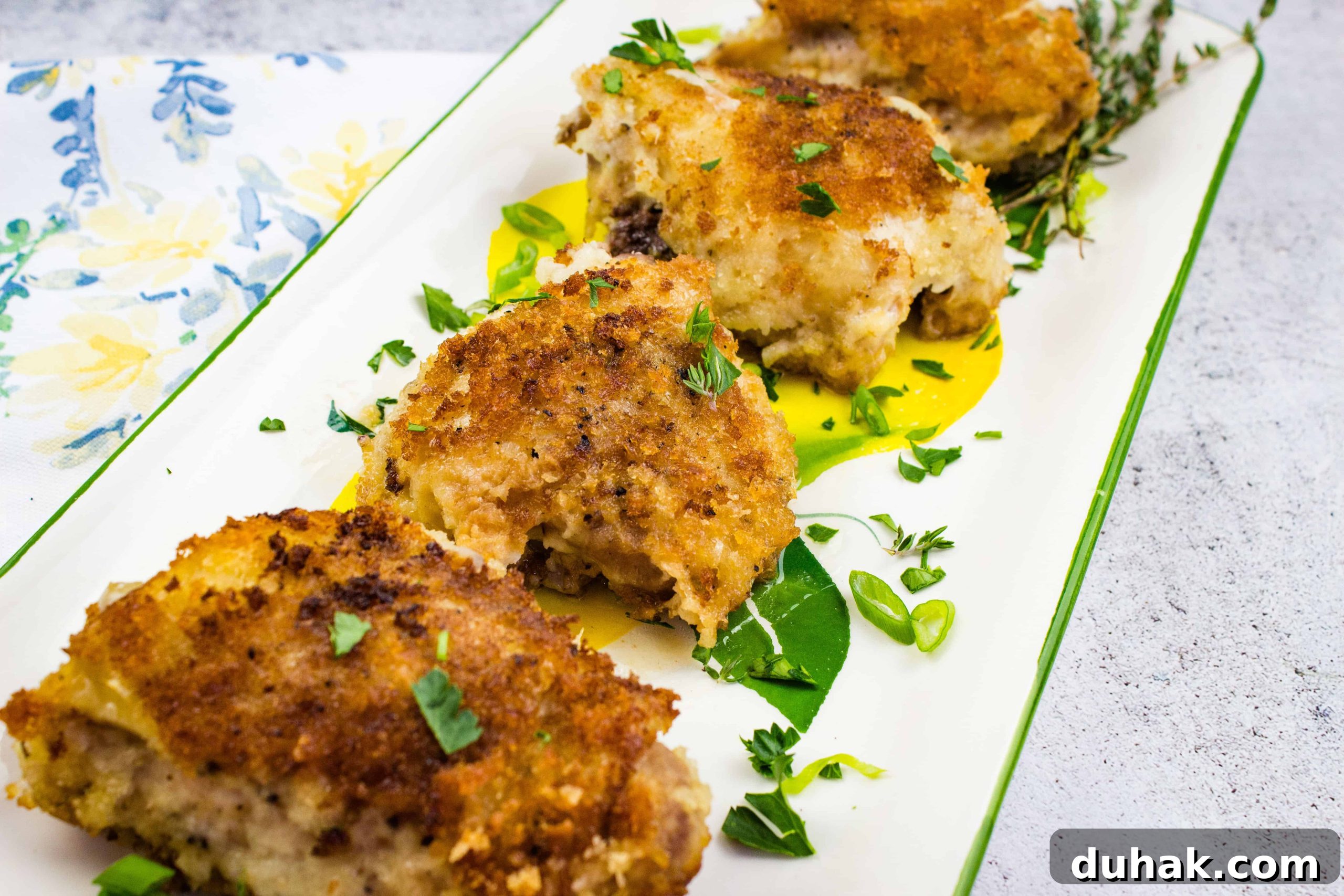 37 Comfort Food Recipes That Keep Reappearing on Menus 30 Oven Baked Chicken Thighs on a platter.