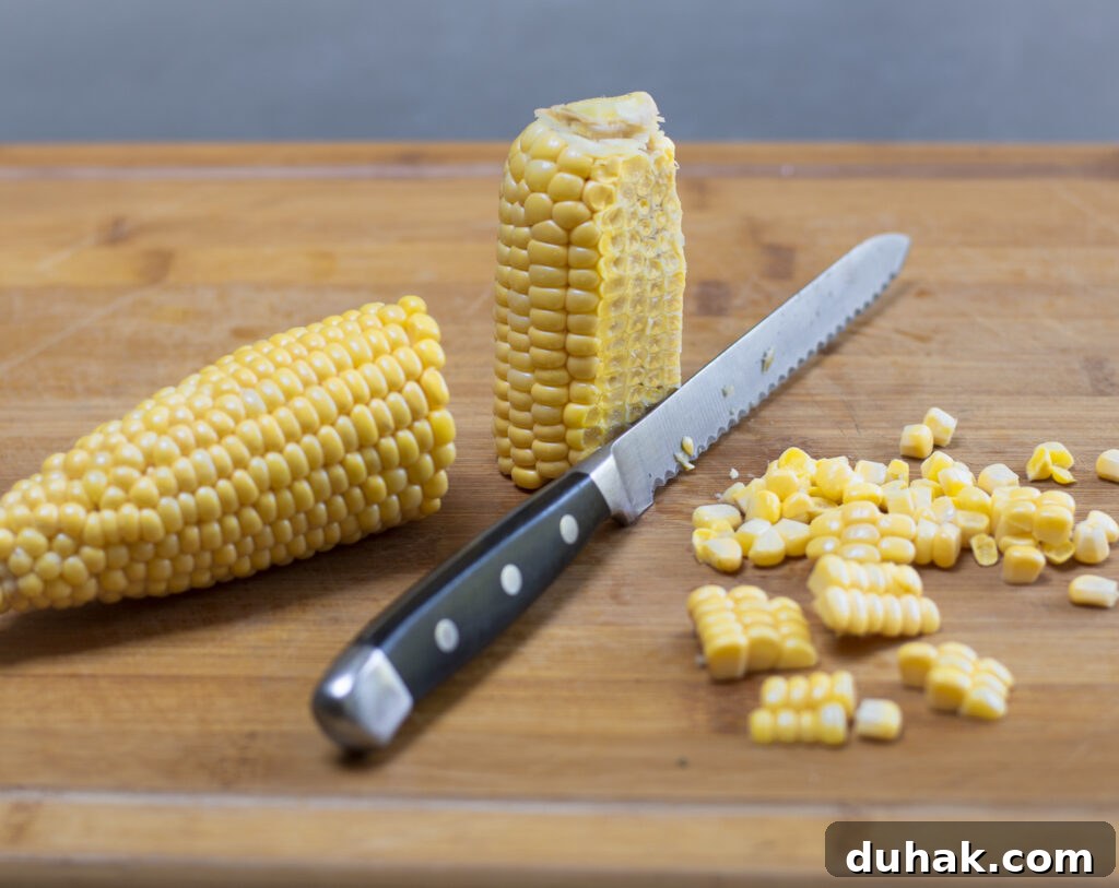 Removing corn kernels from the cob