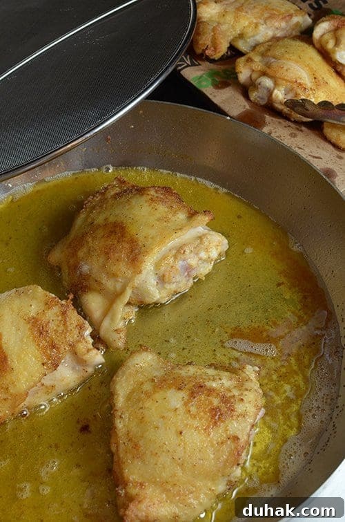 Classic Sausage and Chicken Gumbo Recipe — Hearty Creole Stew 5 Searing seasoned chicken for sausage and chicken gumbo.