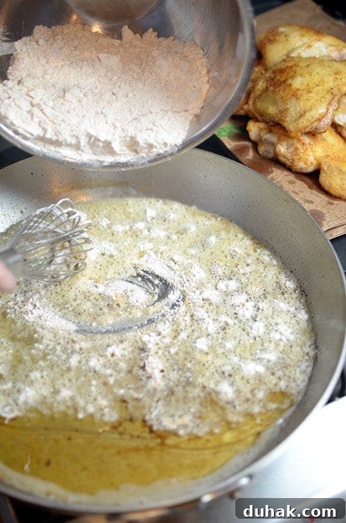 Classic Sausage and Chicken Gumbo Recipe — Hearty Creole Stew 6 Making a roux for sausage and chicken gumbo