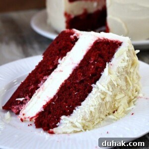 Red velvet cheesecake on a plate.