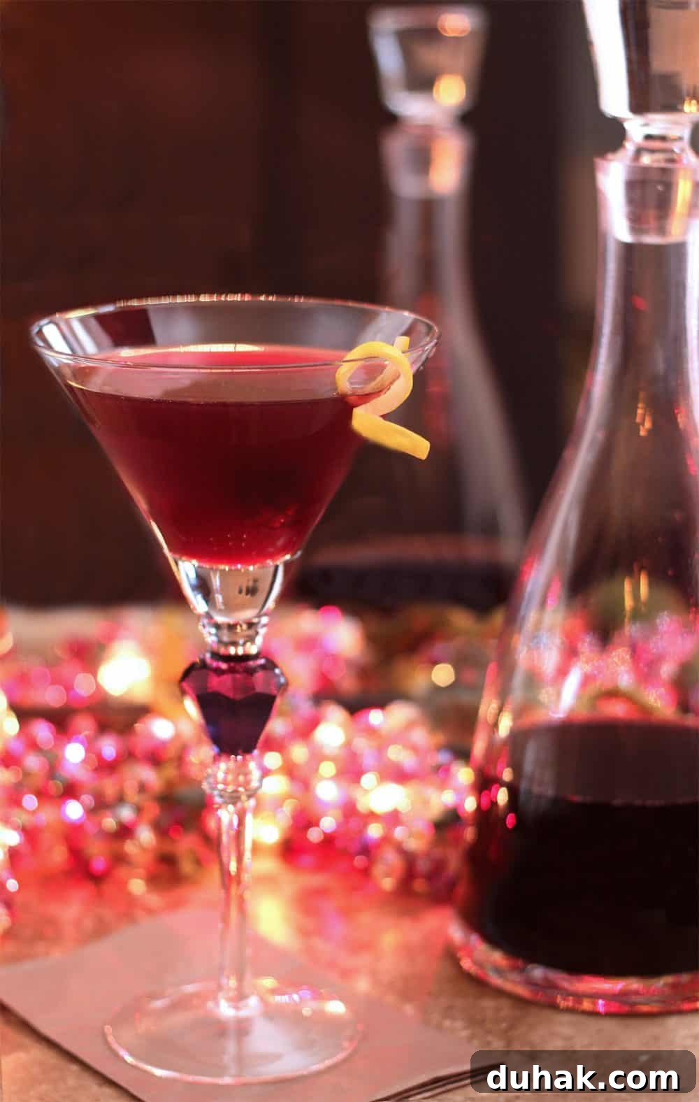 Make a beautiful Cosmopolitan cocktail using homemade Raspberry Liqueur, served in a martini glass.