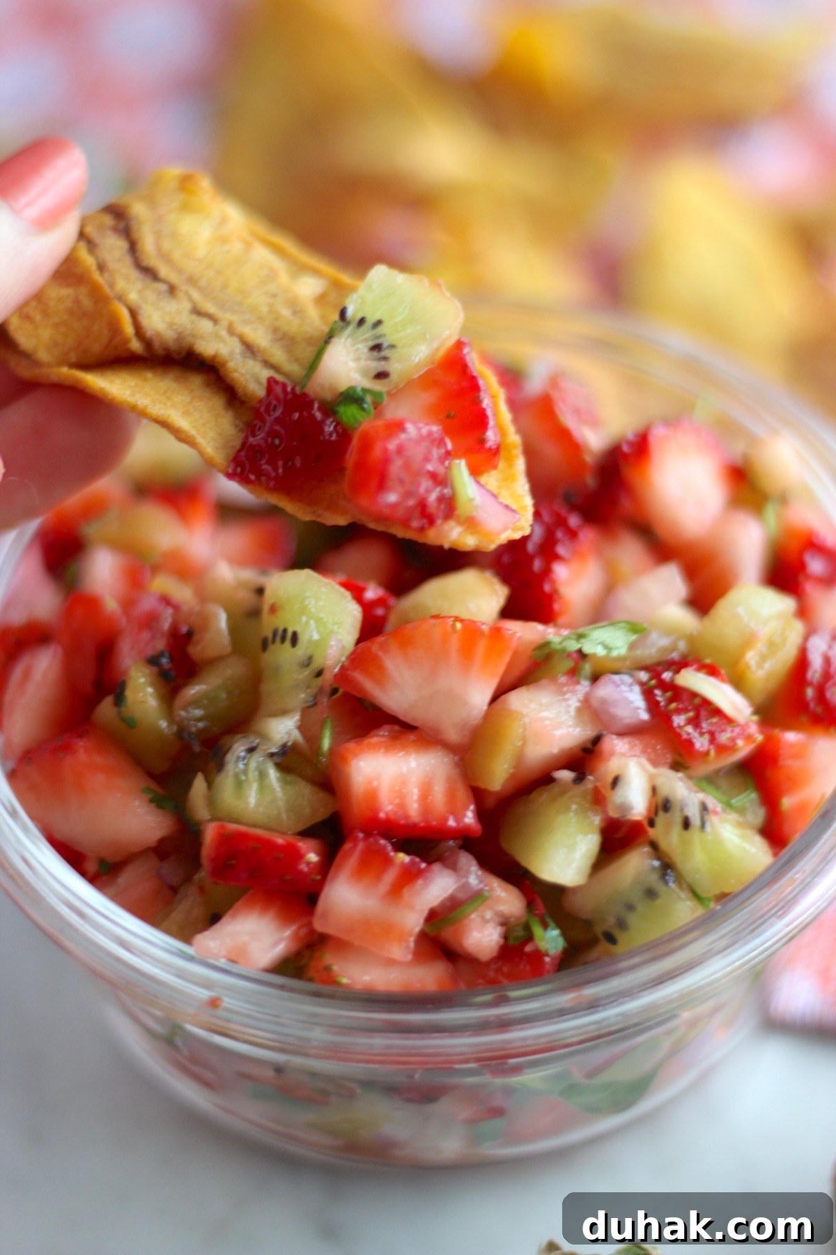 Strawberry Kiwi Fruit Salsa - a sweet, tangy fresh salsa that is delicious with your favorite chips and makes a colorful, healthy snack! | fedandfulfilled.com