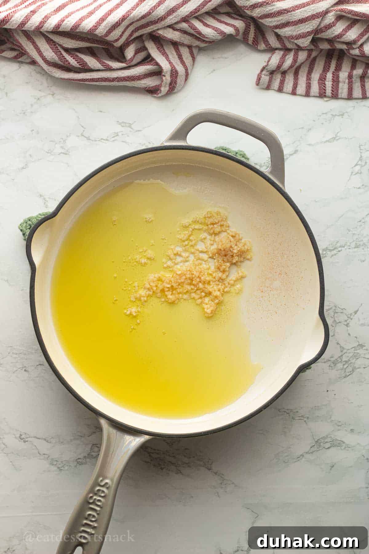 Creamy Ricotta and Butter Bean Salad with Lemon Herb Dressing 4 Olive oil and garlic in pan.