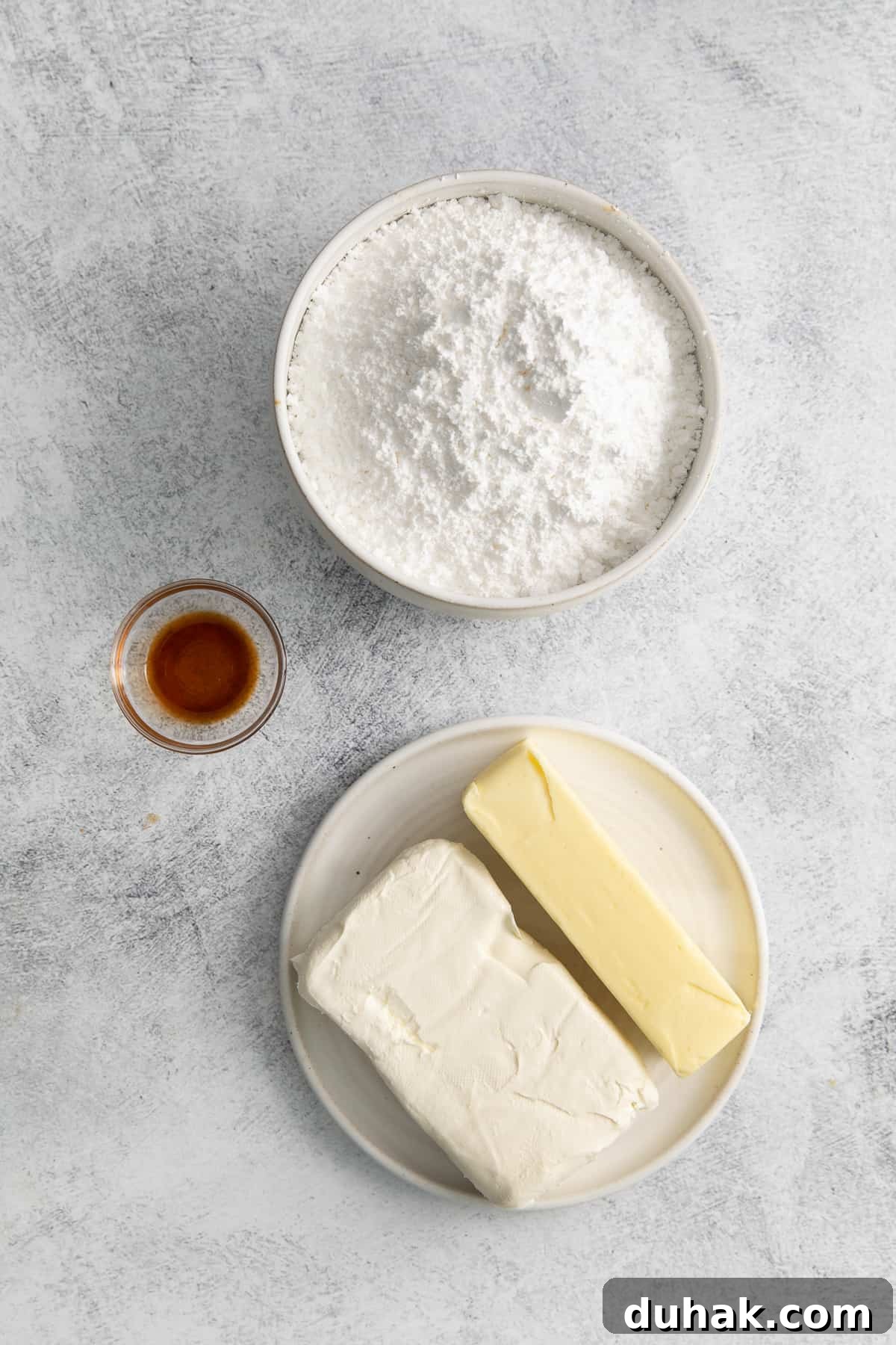 Ingredients for cream cheese buttercream frosting.
