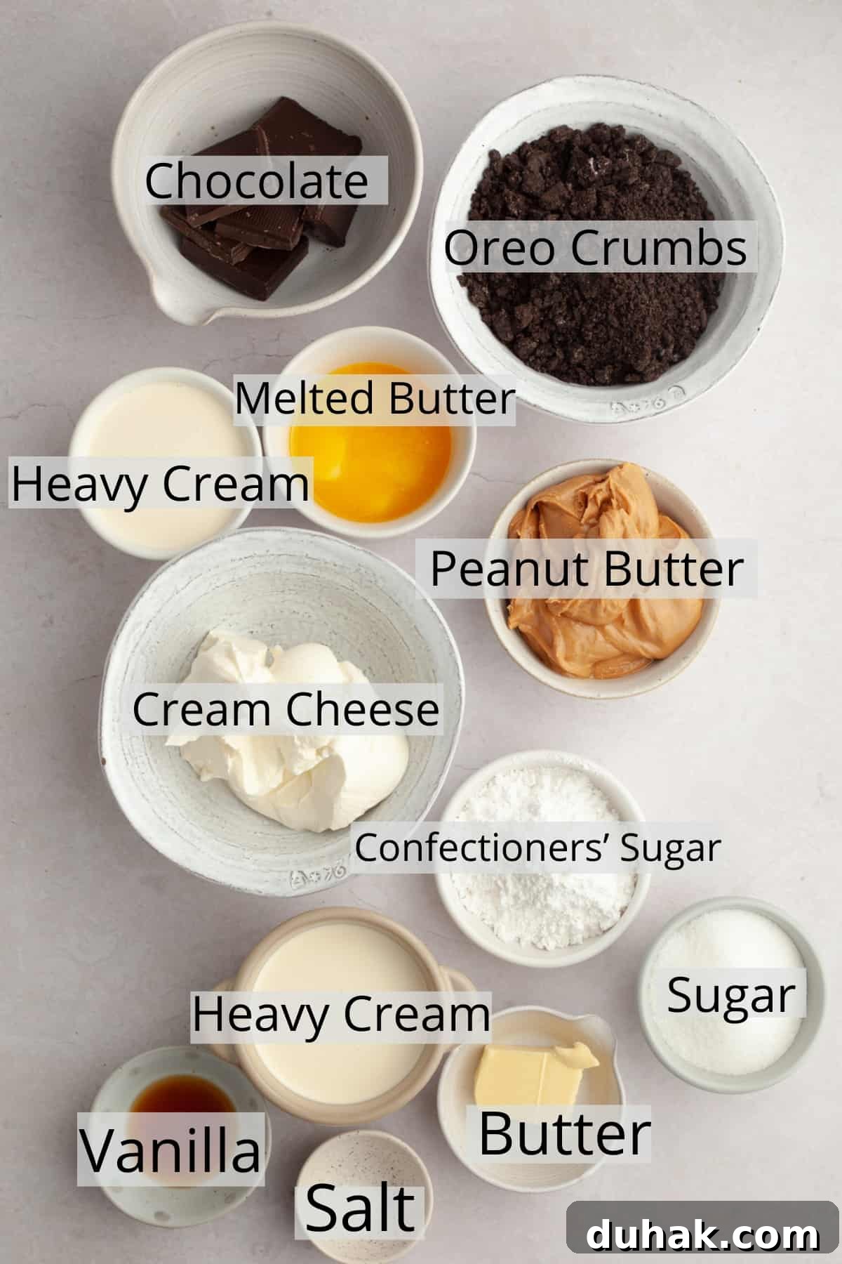 All the ingredients needed to make oreo peanut butter pie, weighed out into small bowls.