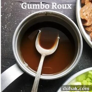 gumbo roux recipe in a small saucepan with a spoon