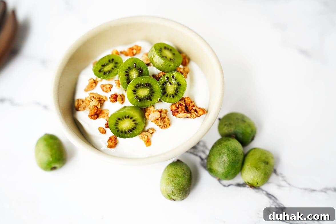 Kiwi Berries: Small Fruit Guide, Taste, Uses, and Benefits 5 Yogurt topped with kiwi berries