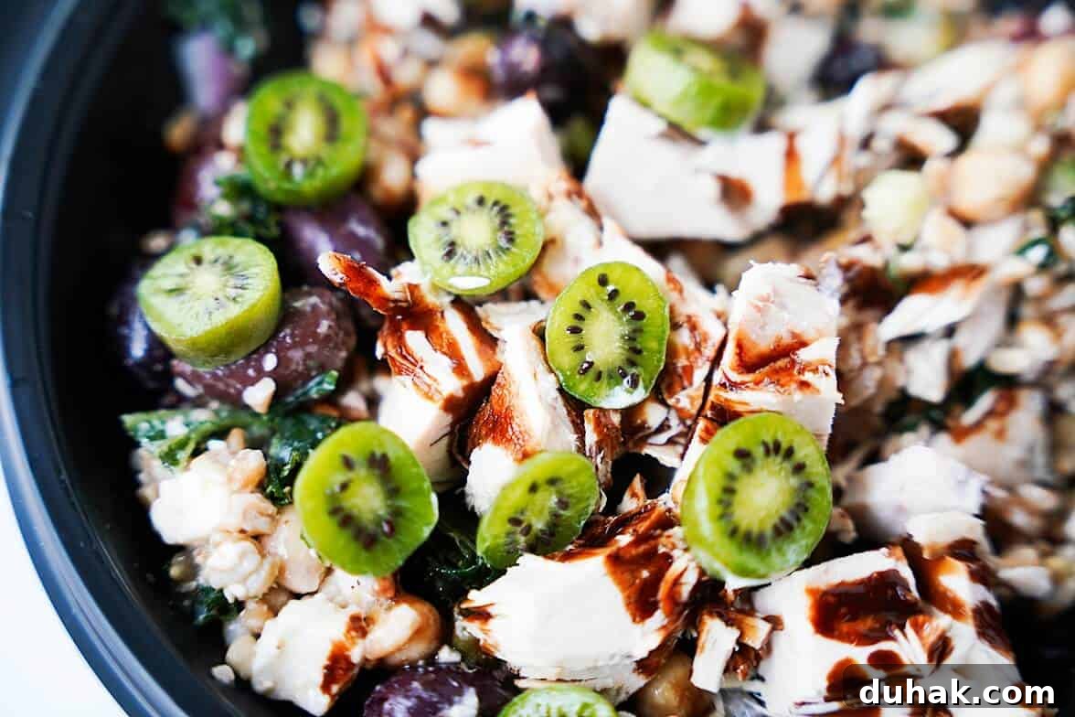 Kiwi Berries: Small Fruit Guide, Taste, Uses, and Benefits 6 A salad with halfved kiwi berries