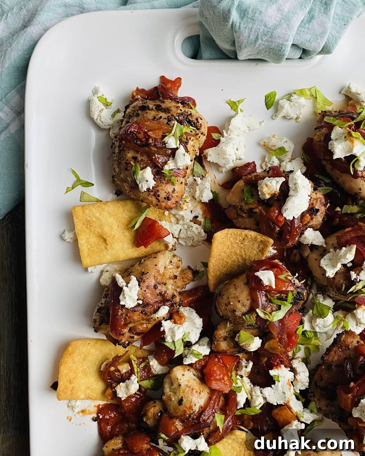 Grilled Chicken with Tomato Bruschetta and Goat Cheese 8 platter with grilled chicken thighs and bruschetta