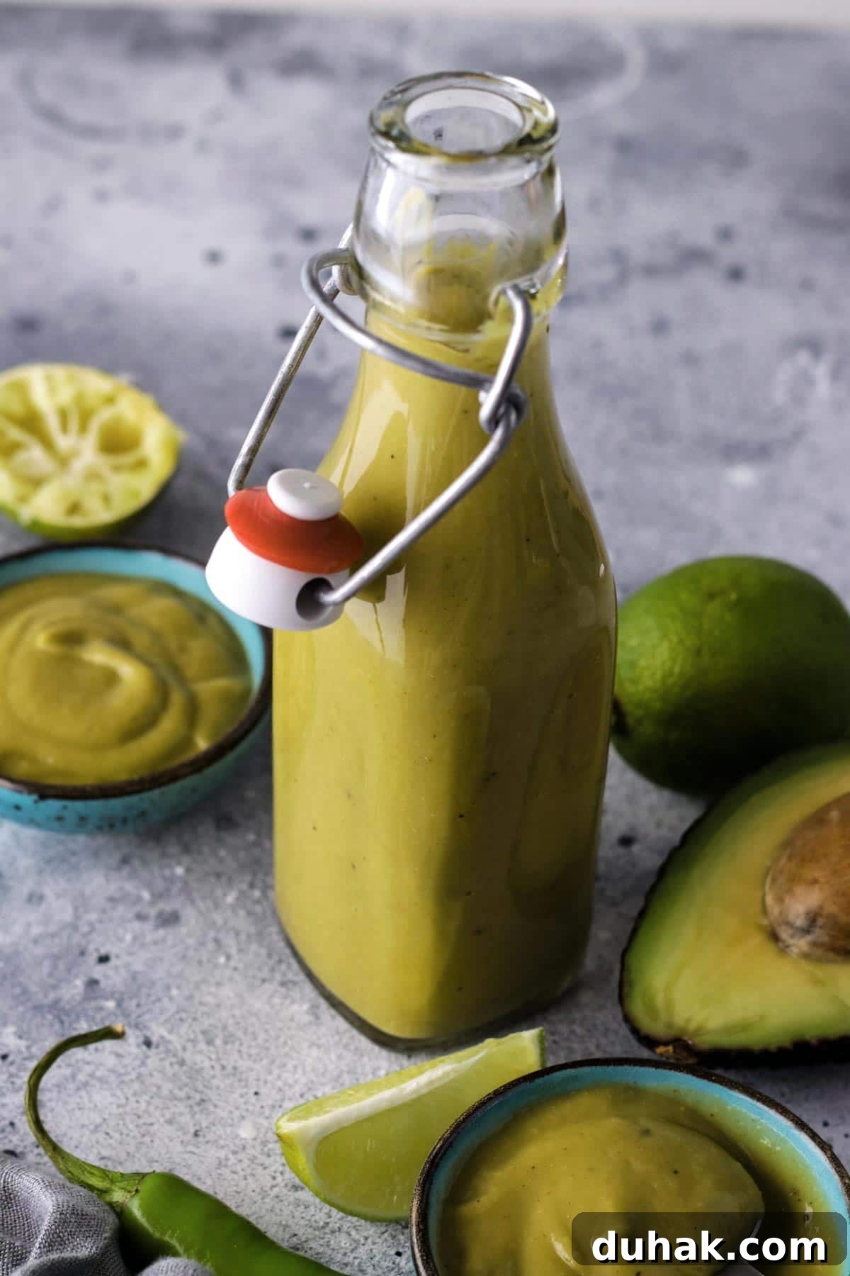 Creamy Avocado Vegan Dressing Recipe for Salads & Bowls 3 Vegan Avocado Dressing in a Glass Bottle