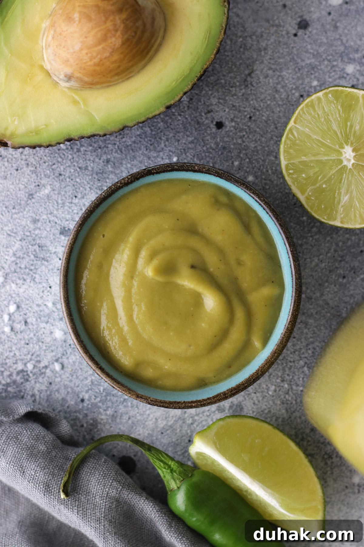 Creamy Avocado Vegan Dressing Recipe for Salads & Bowls 9 Dressing in a Turquoise Bowl