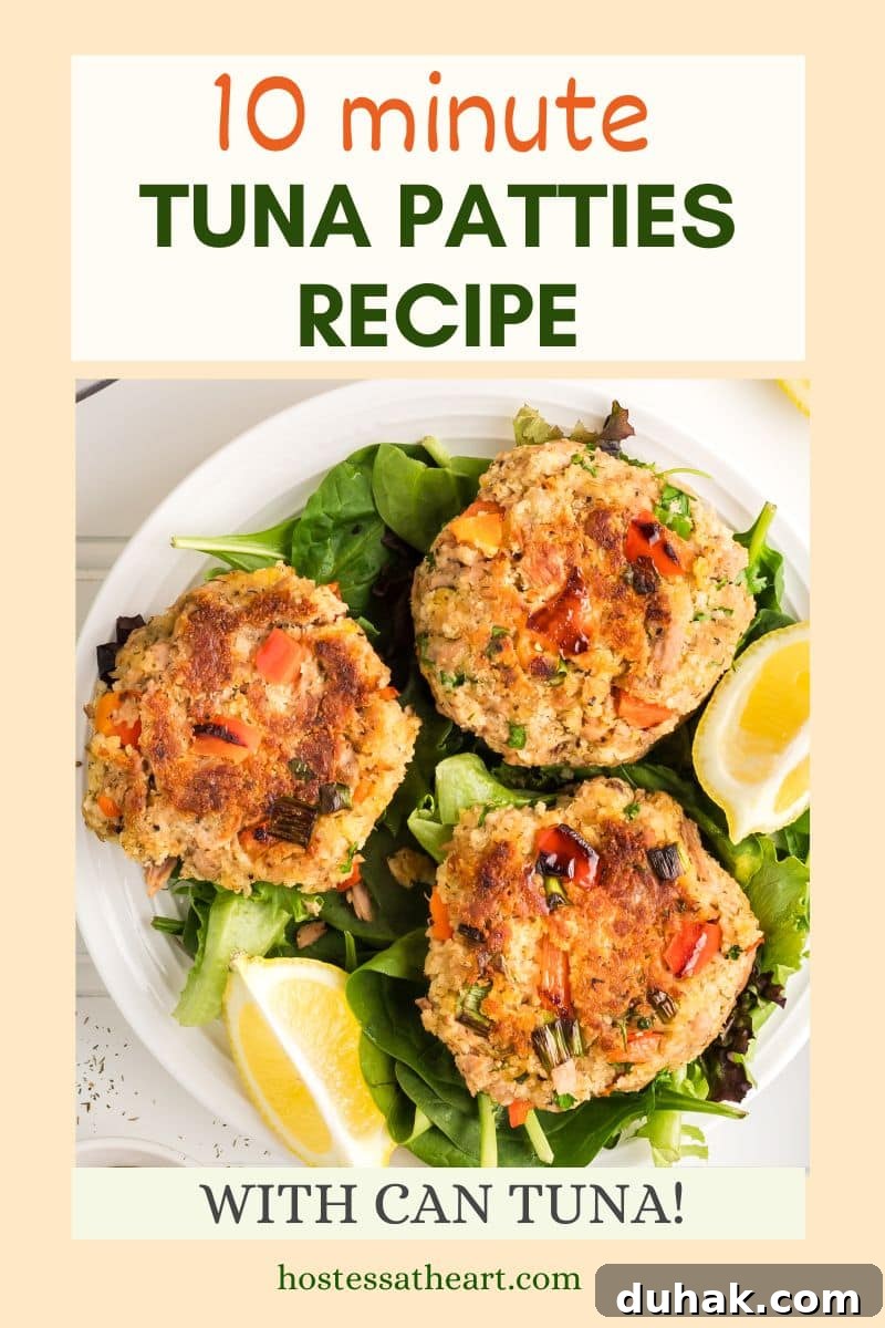 An image for Pinterest of three canned tuna patties sitting on a bed of lettuce next to wedges of lemon. Hostess At Heart