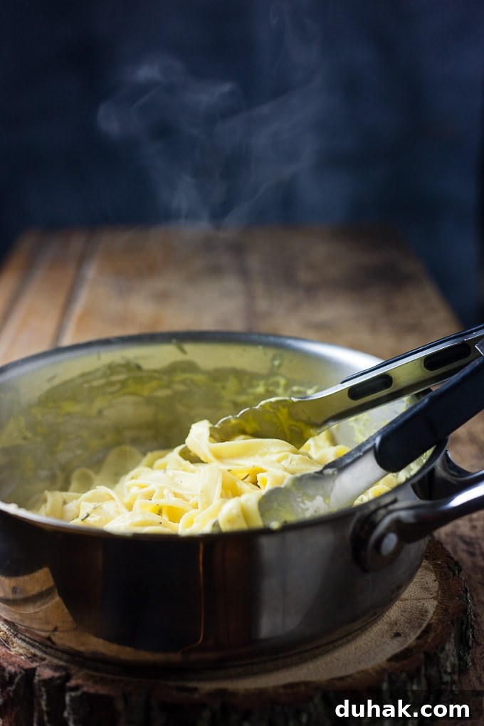 Creamy Pumpkin Alfredo Pasta Recipe for Fall Dinner 3 Pumpkin alfredo fettuccine with mushrooms.