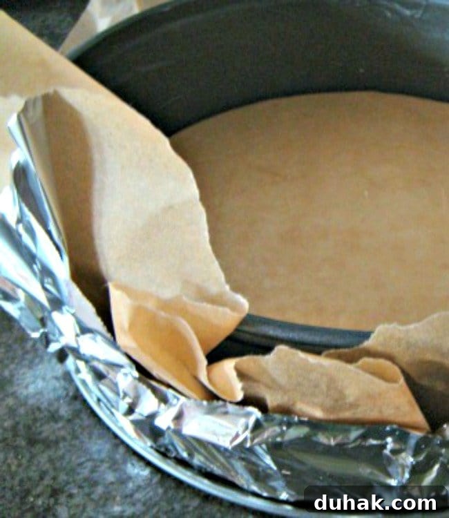 Preparing the springform pan for a water bath