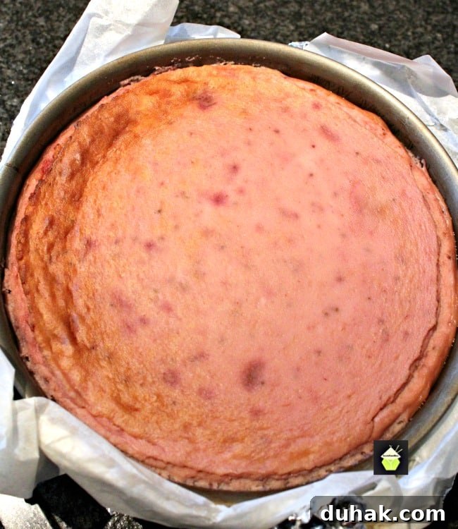 Strawberry and Coconut Ricotta Cheesecake after baking