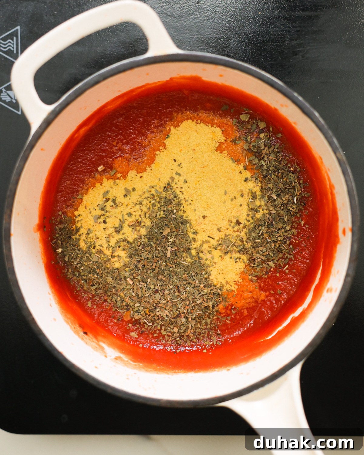 overhead tomato sauce in pot