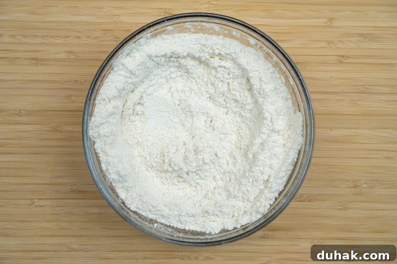 Whisking the flour, salt and bi-carb soda