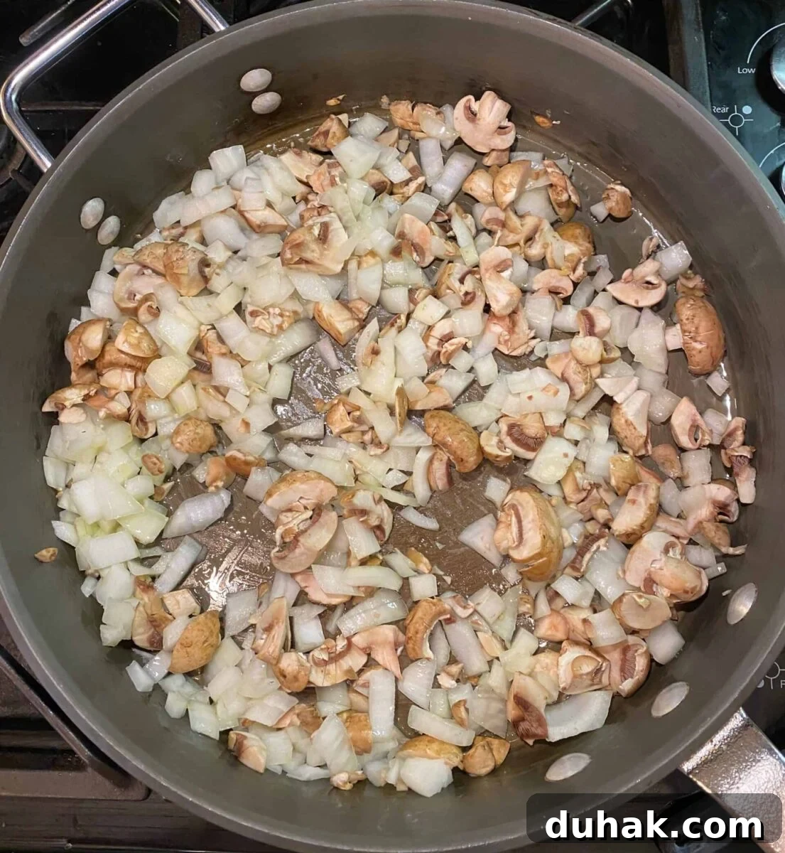 Creamy Spicy Alfredo Sauce Recipe for Pasta and Wings 6 Diced onions and mushroom in a large skillet.