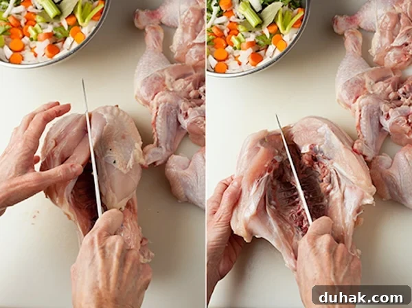 Cutting up a raw whole chicken for broth, with broth vegetables on the side. 