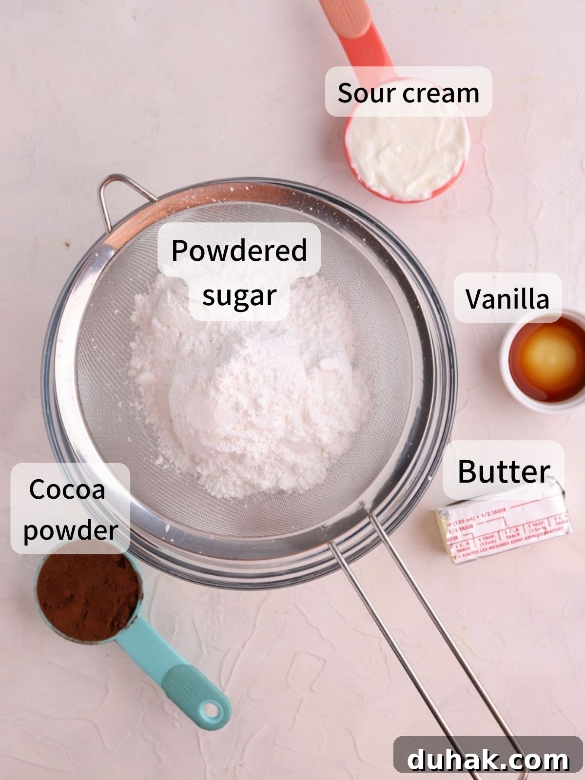 Moist Banana Spice Cake Recipe with Warm Cinnamon Flavor 4 Labeled ingredients for chocolate sour cream frosting
