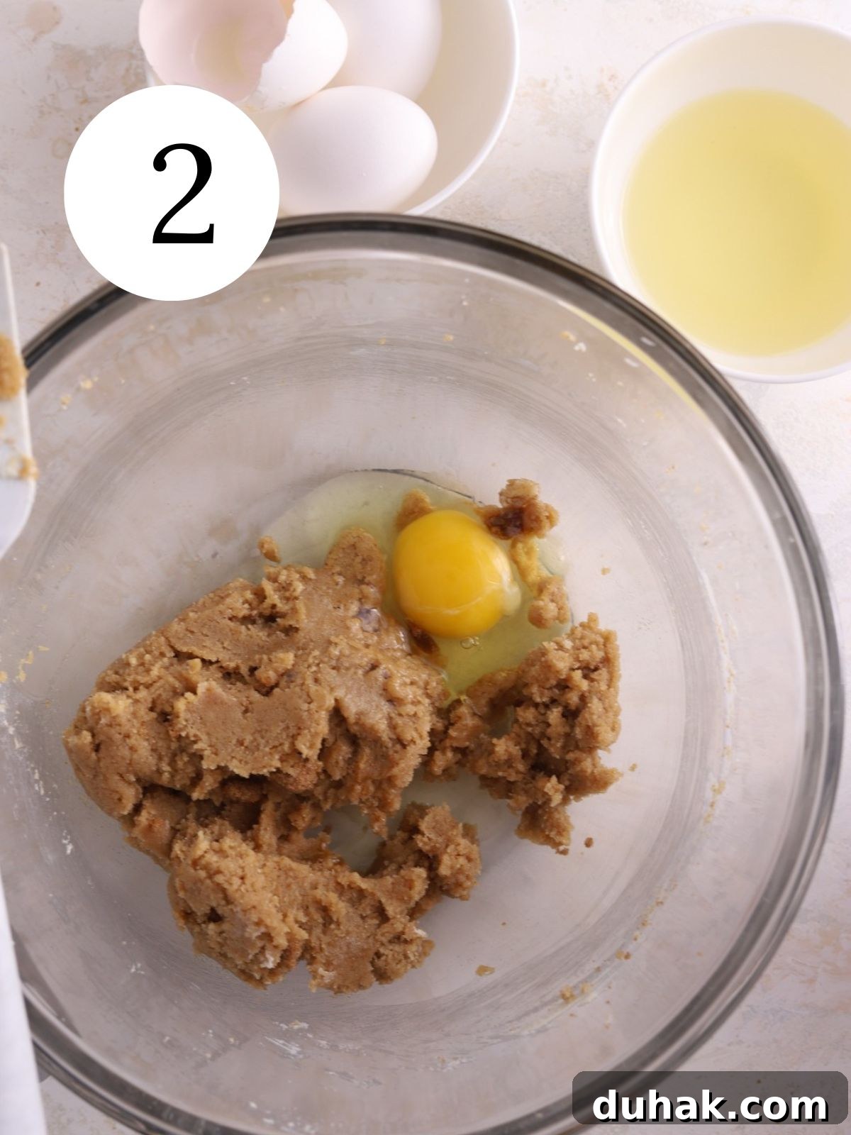Moist Banana Spice Cake Recipe with Warm Cinnamon Flavor 6 Egg added to sugar and butter mixture
