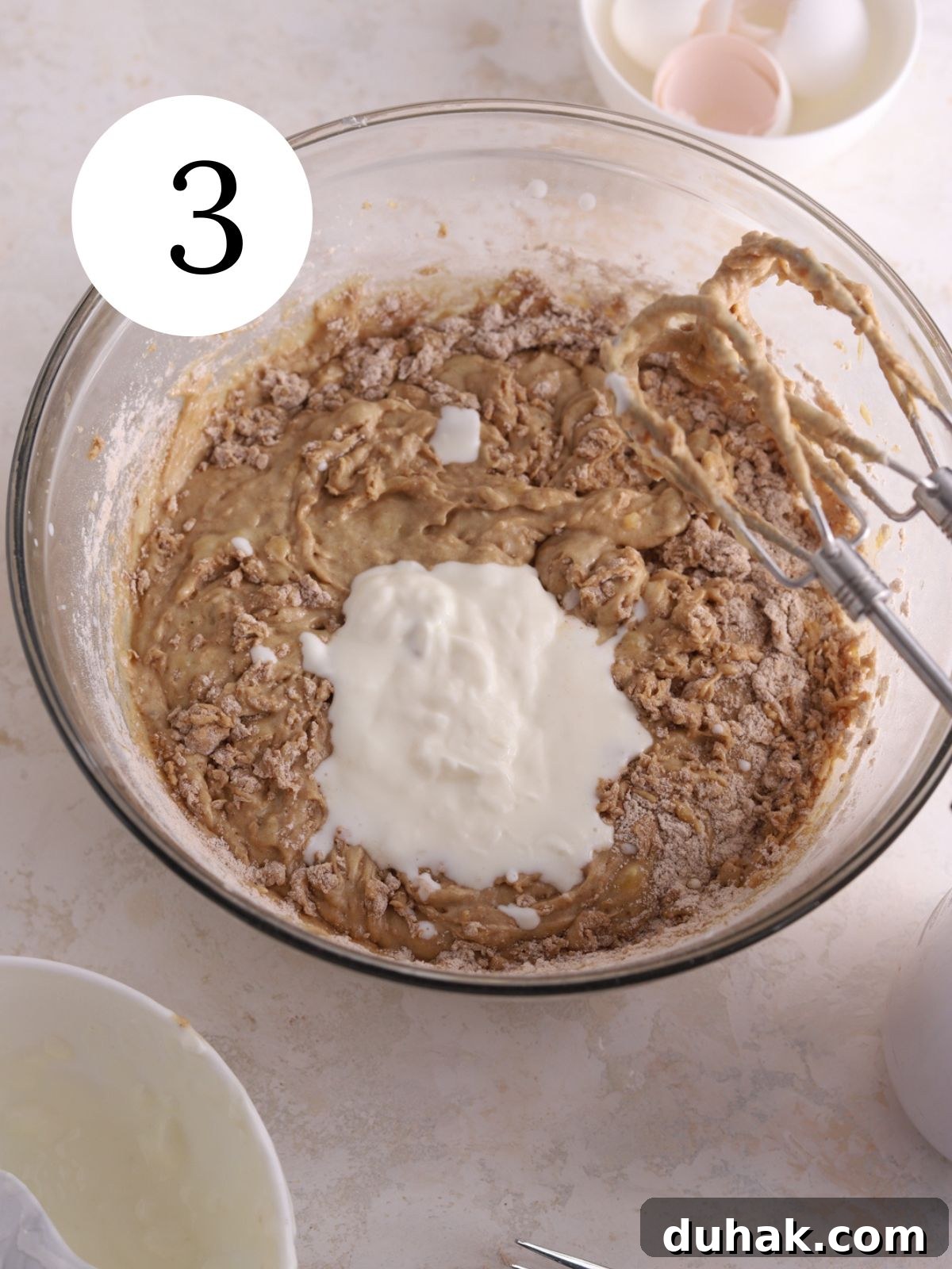 Moist Banana Spice Cake Recipe with Warm Cinnamon Flavor 7 Sour cream and milk added to batter