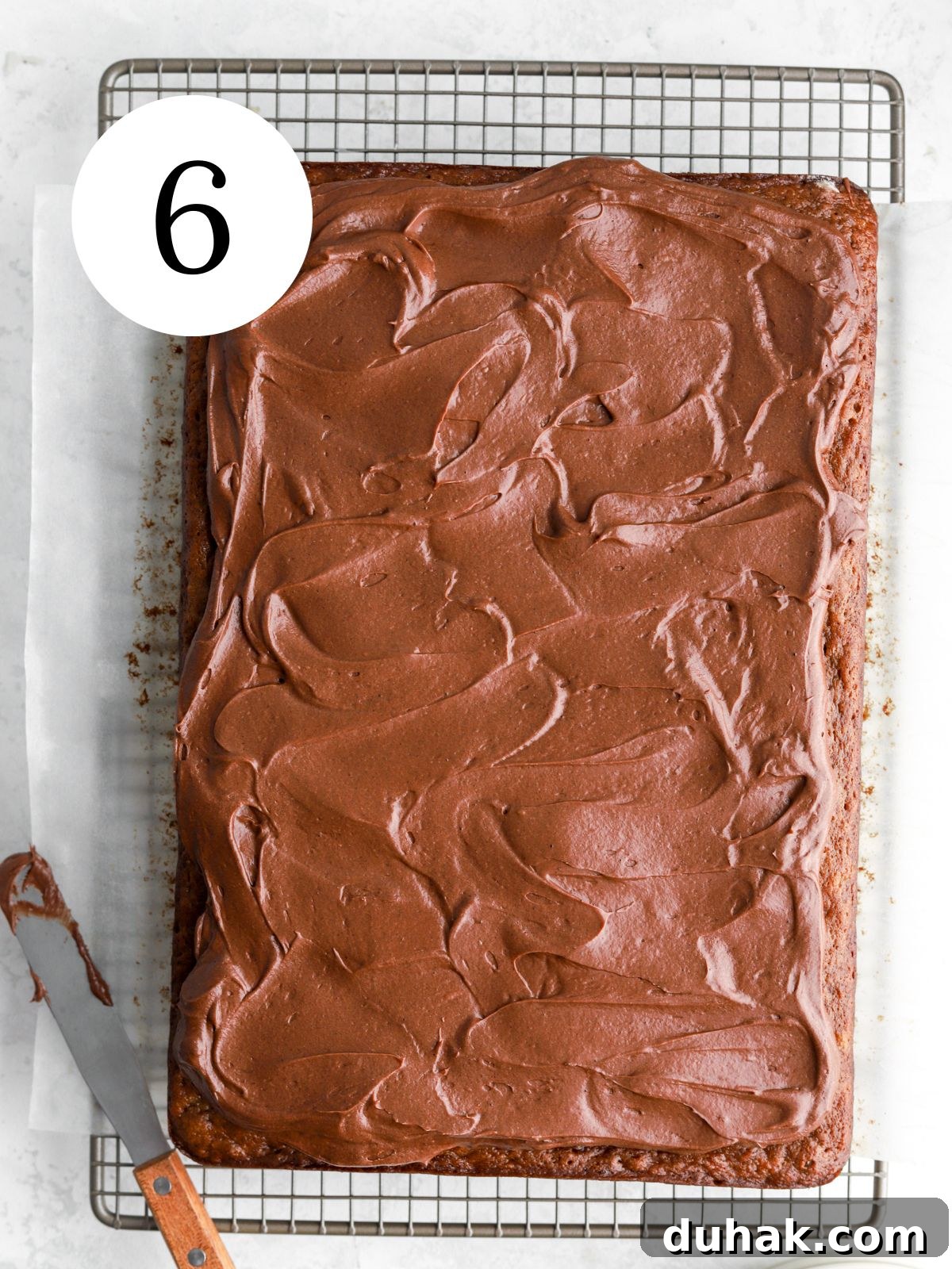 Moist Banana Spice Cake Recipe with Warm Cinnamon Flavor 10 Frosted rectangular banana cake