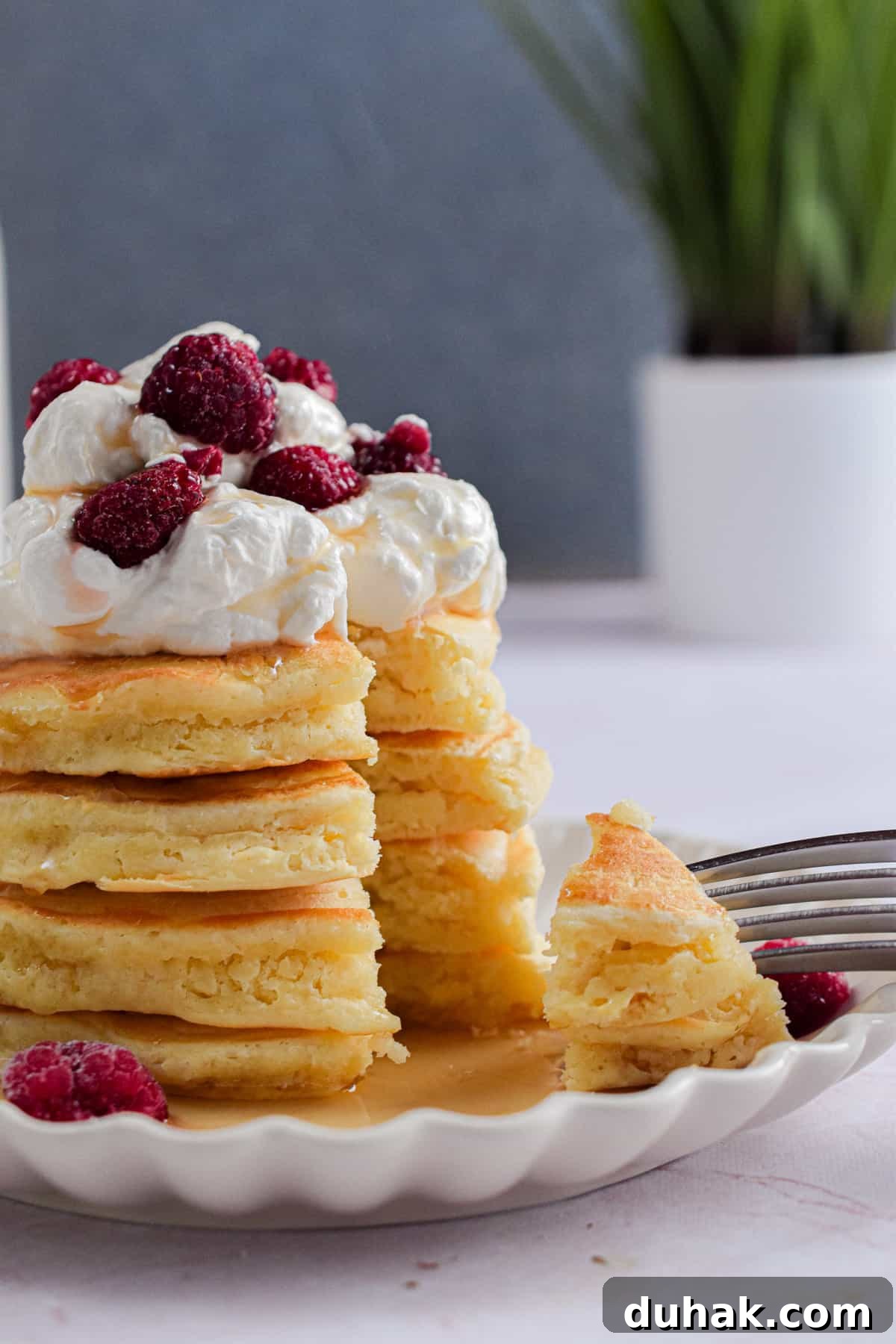 All-Purpose vs Self-Rising Flour: When to Use Each Type 3 A fork is holding a piece of the stack of pancakes with self-rising flour.