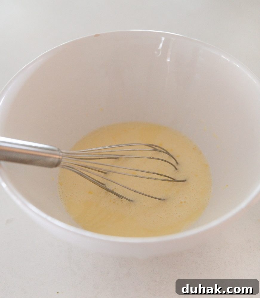 blueberry muffin batter in mixing bowl
