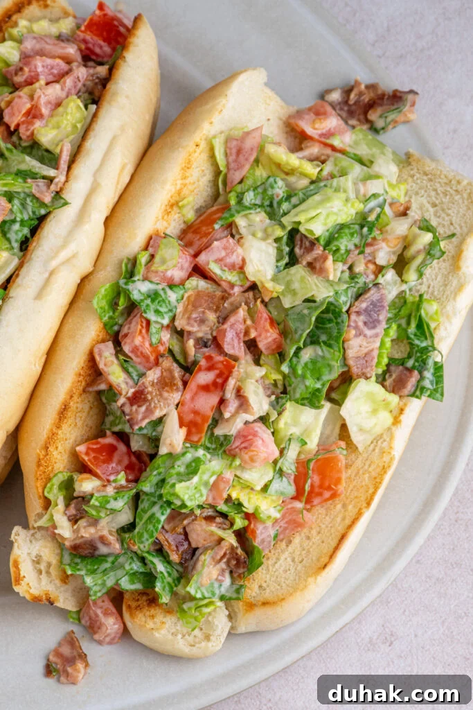 A chopped BLT sandwich on a serving platter.