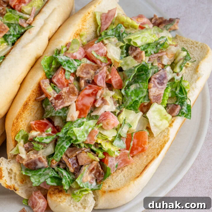 A chopped BLT sandwich on a serving platter.