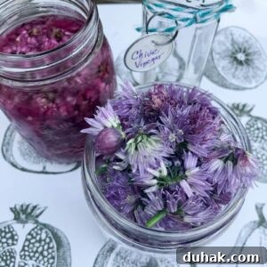 chive flowers stuffed in jar
