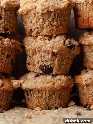 stacks of unwrapped gf banana chocolate chip muffins