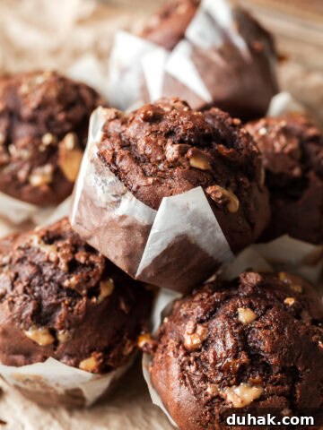 gluten free chocolate banana muffins topped with chunks of toffee bar (heath bar), easy one bowl recipe