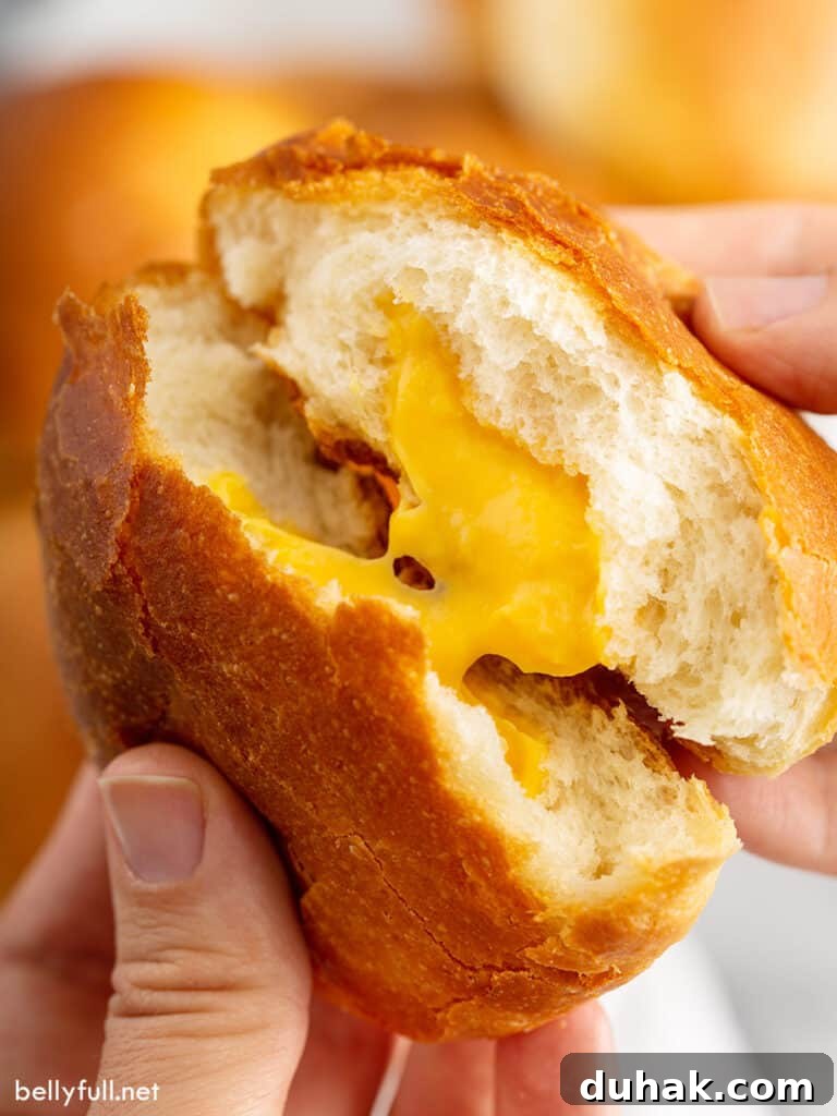 Cheese Zombies: How to Make Creepy Savory Appetizers for Parties 2 Close up image of cheese zombie being split in half.