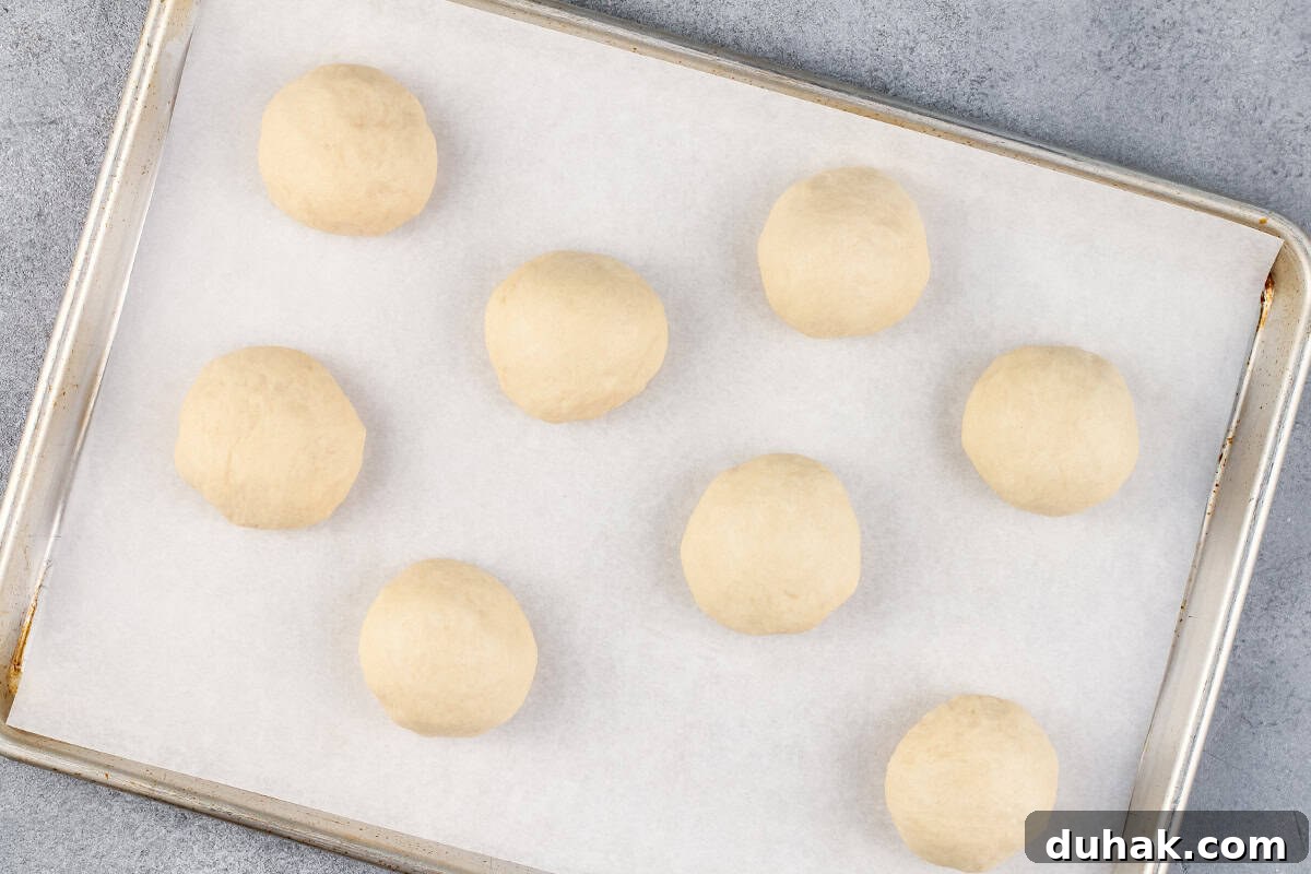 Cheese Zombies: How to Make Creepy Savory Appetizers for Parties 9 stuffed dough balls on baking sheet