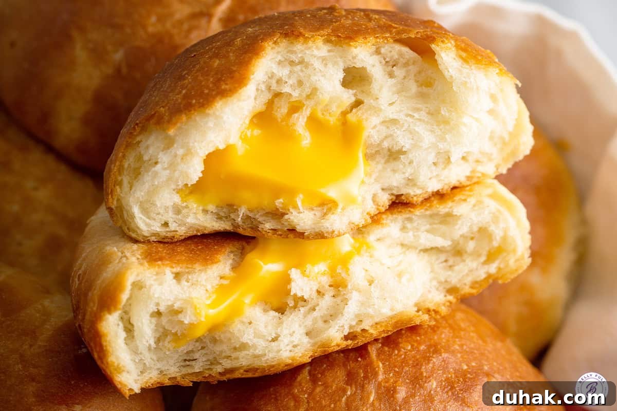 Cheese Zombies: How to Make Creepy Savory Appetizers for Parties 11 close up cheese zombies split in half with gooey cheese