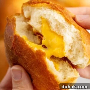 Cheese Zombies: How to Make Creepy Savory Appetizers for Parties 3 close up image of cheese zombie being split in half