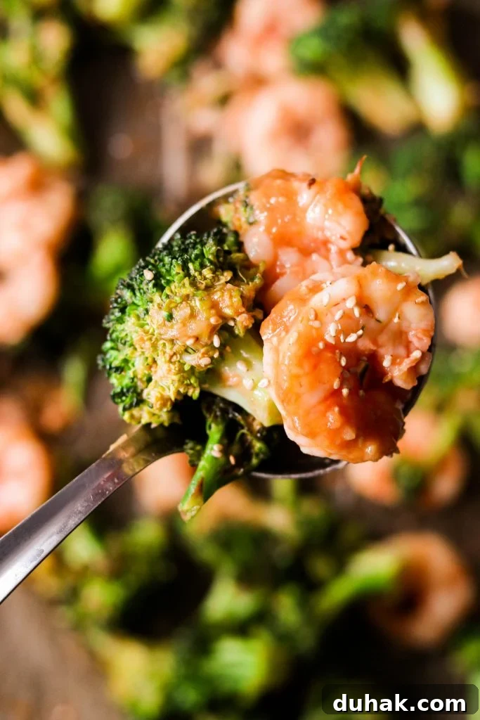 Whole30 and Paleo Sweet and Sour Shrimp with Broccoli — Sheet Pan Meal 5 close up shot of shrimp and broccoli sheet pan dinner