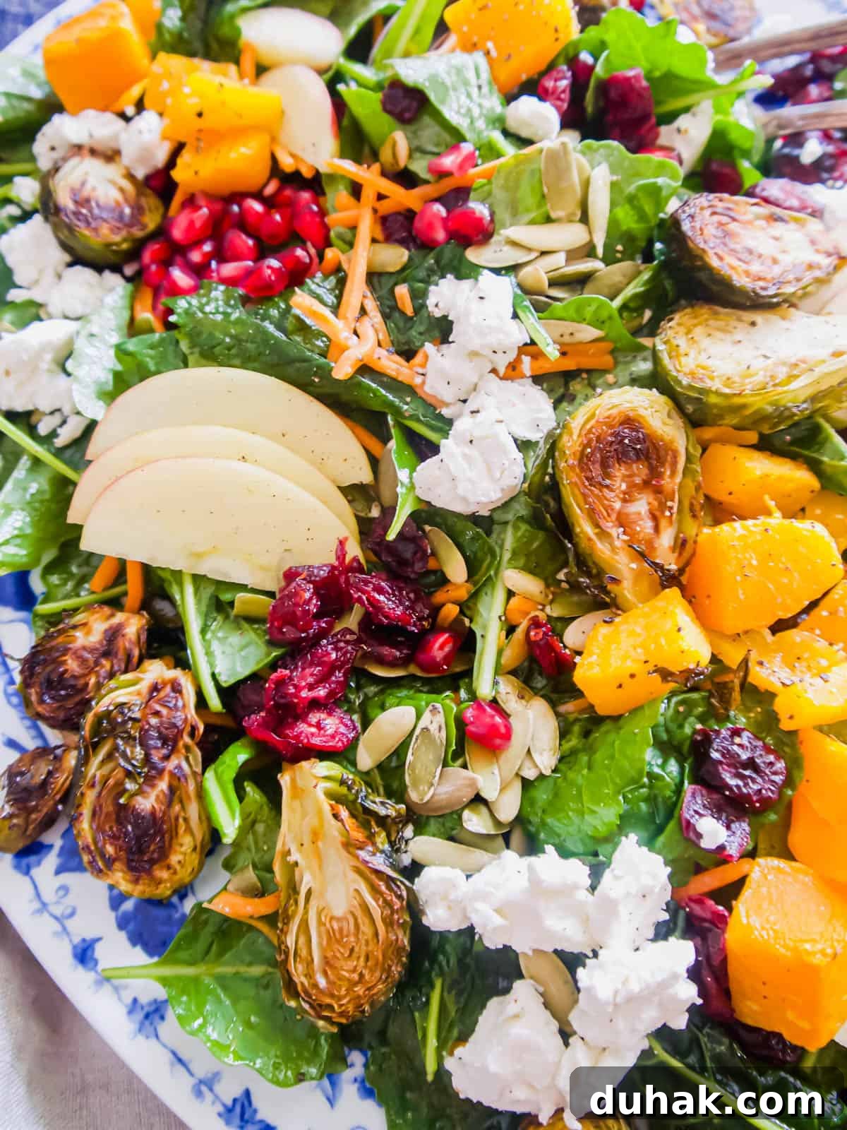 Autumn Harvest Salad with Maple Vinaigrette and Roasted Squash 9 Autumn harvest salad in a large bowl.