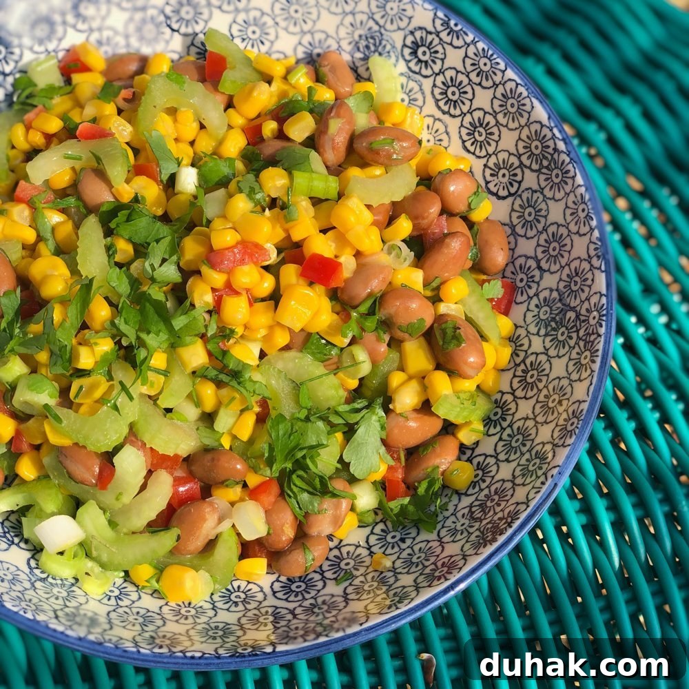 Bean Salad made with borlotti beans, sweetcorn, celery, red pepper, salad onions and Italian dressing.