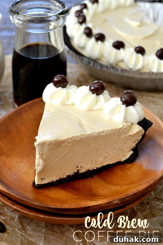Cold Brew Coffee Pudding Pie Recipe for Coffee Lovers 9 cold brew coffee pie slice on a wooden plate with coffee in background